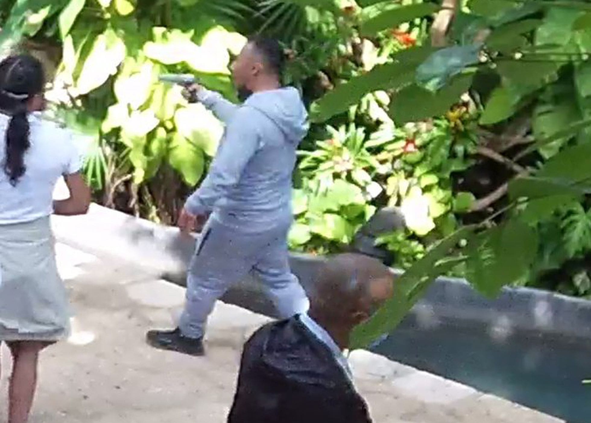 The alleged assassin, captured by the Xcaret resort's security camera.
