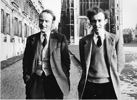 Francis Crick and James D. Watson walk along the Cambridge backs.