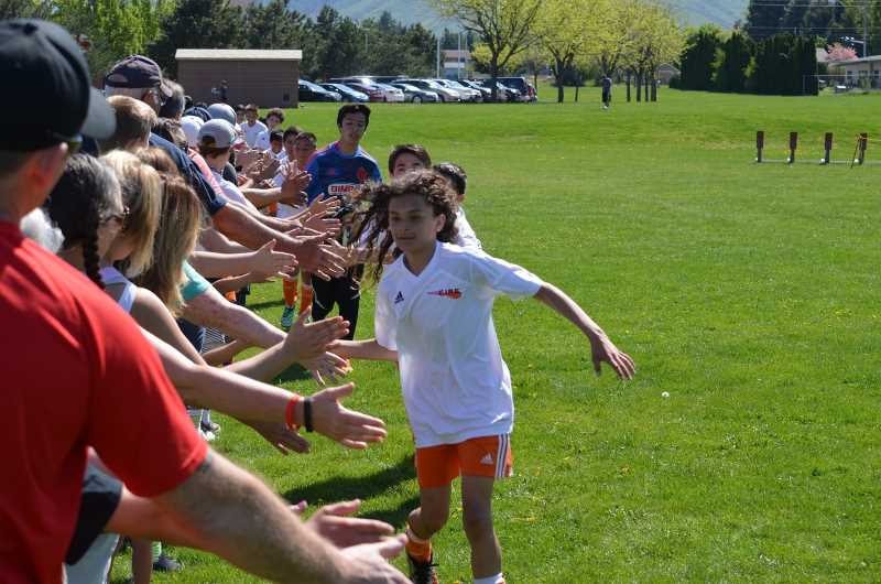 A diverse team is a strong team: Inclusive youth sports programs benefit children of all sizes.