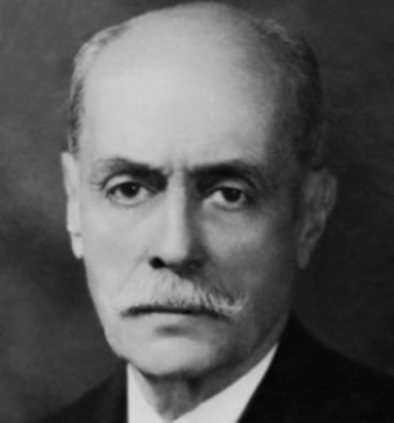Black and white portrait of Federico Gamboa, a middle-aged man in a suit with a serious expression.