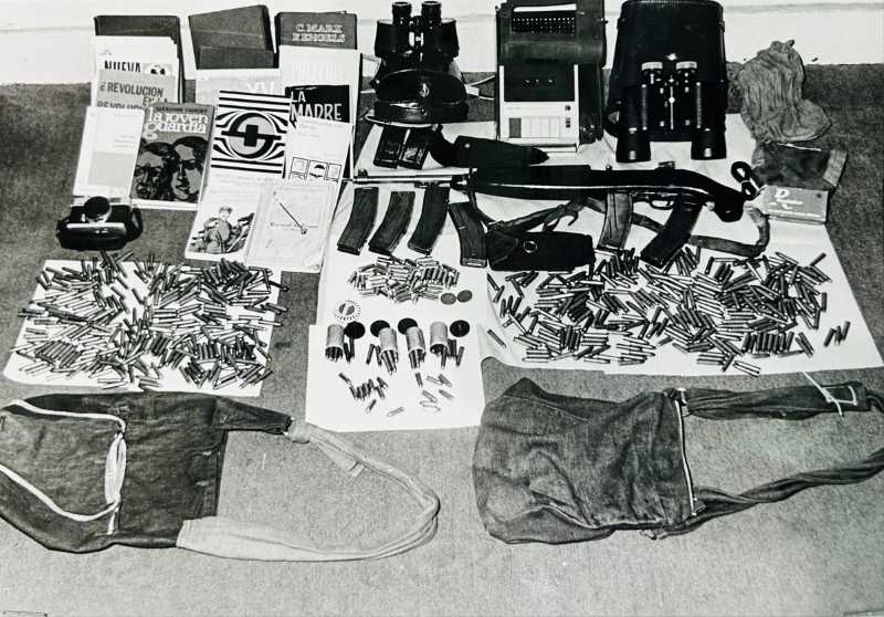 Photograph showing objects found in the Dodge Dart automobile.