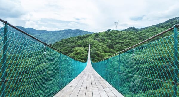 Dare to cross the hanging bridge of the Ecological Park "Mundo Aventura" in Mazamitla, Jalisco.