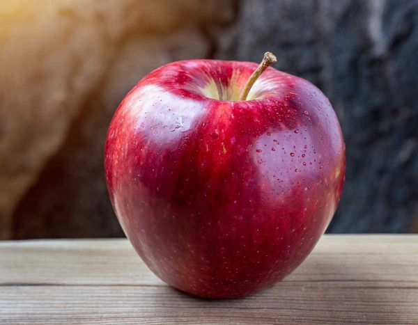  A close-up of a vibrant apple, rich in this natural compound, known for its health benefits.