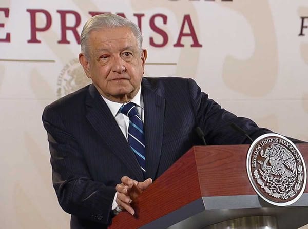A close-up of President Andrés Manuel López Obrador with his slightly irritated eye visible.