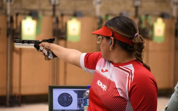 Andrea Ibarra Miranda, stands confidently, embodying the spirit of determination and excellence in sport shooting.