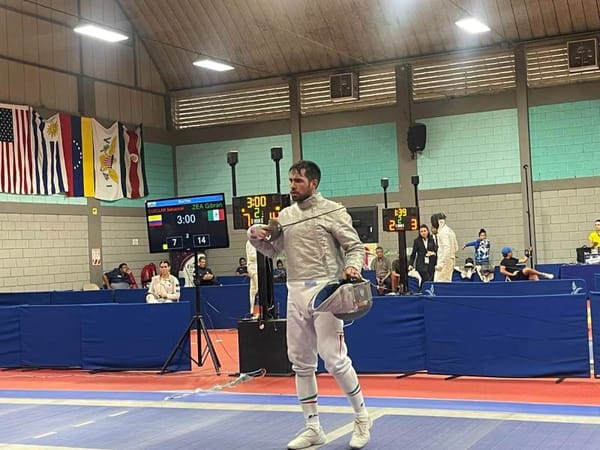 Gibrán Zea Armenta celebrates his victory at the Pan American Pre-Olympic in saber fencing.