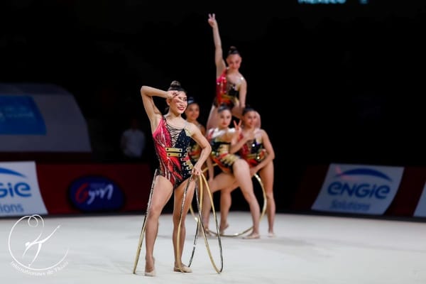 The Mexican rhythmic gymnastics team celebrates their silver medal win at the Grand Prix in Thiais, France.