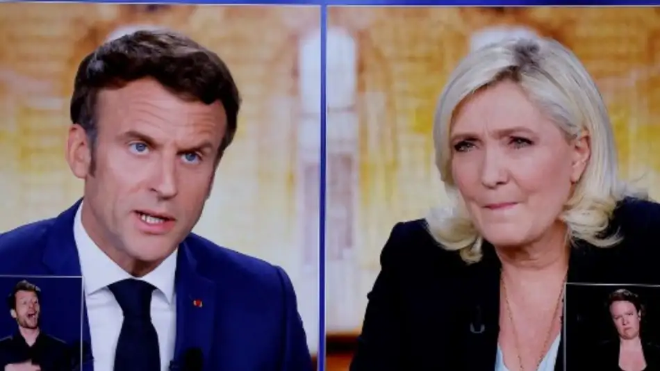 In French TV debate, Macron beats Le Pen.