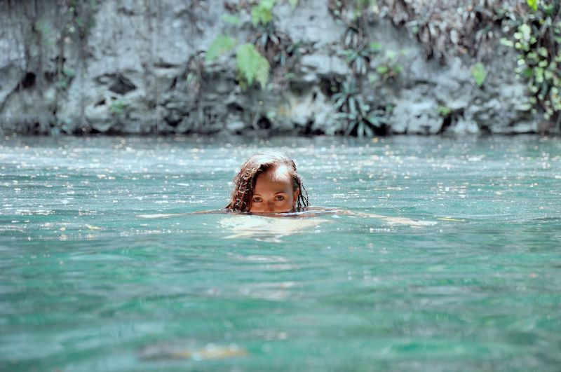 A woman is seen swimming in a centote in Yuctan Peninsula, Mexico.