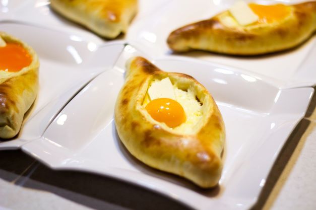 Khachapuri is a unique pie that is baked with yeast dough and filled with cheese.