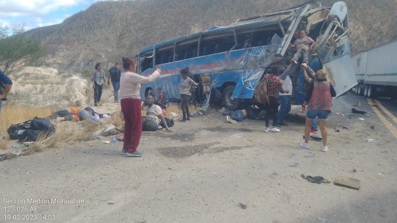 A bus carrying migrants overturns, and 15 people die and more than 30 are injured.