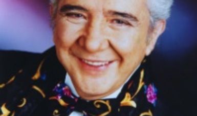 Roberto Cantoral, the iconic Mexican composer, in a portrait photo.