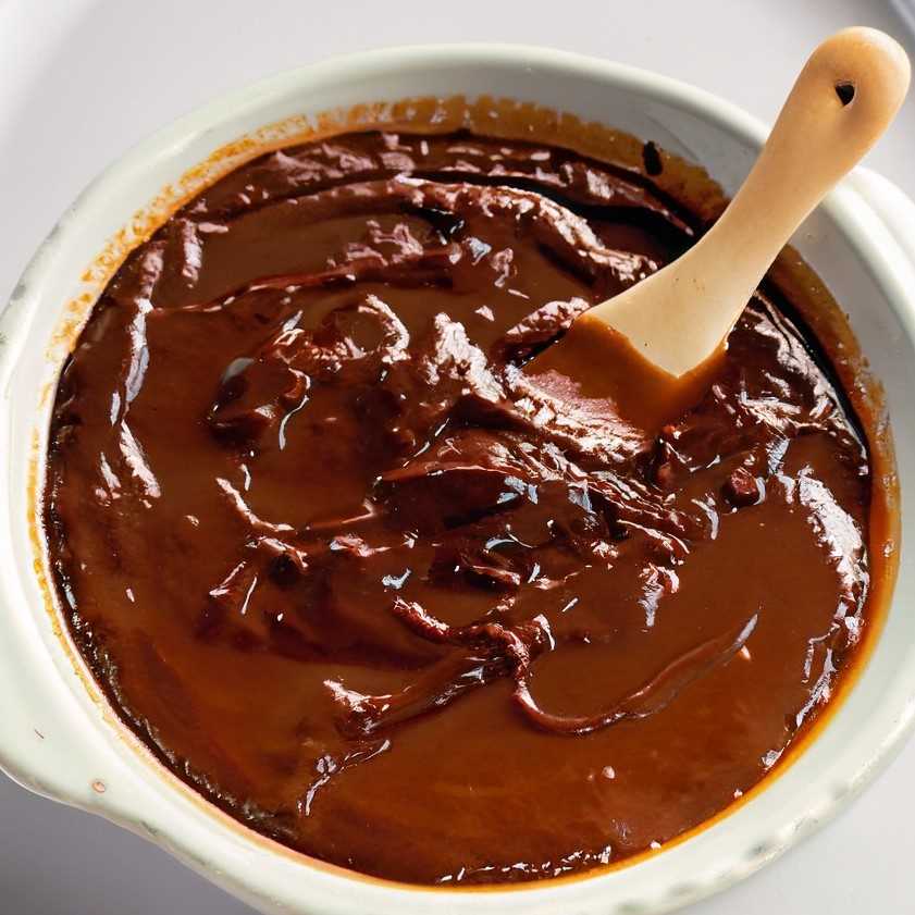 A rich and flavorful mole sauce, achieved through precise unidirectional mixing.