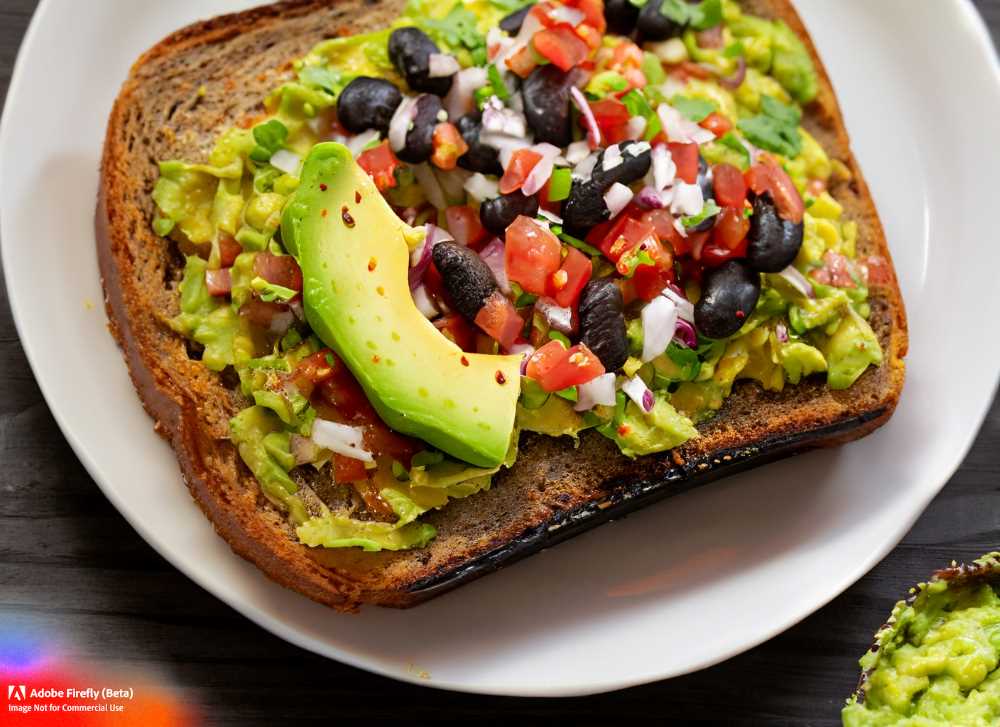 Avocado toast with a Mexican twist! Adding some fresh salsa and black beans.