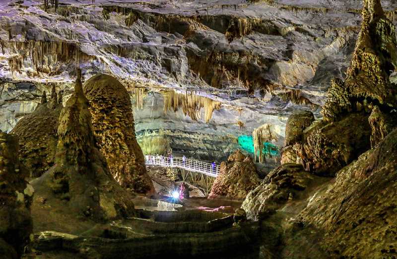 Step into a world of enchantment as you explore the mystical caves of Bustamante.