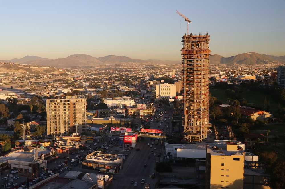 A bustling construction site in Tijuana symbolizes the country's remarkable investment increase.