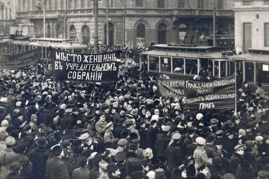 Women march for their rights on Women's Day, setting the stage for the Russian Revolution of 1917 in Petrograd.