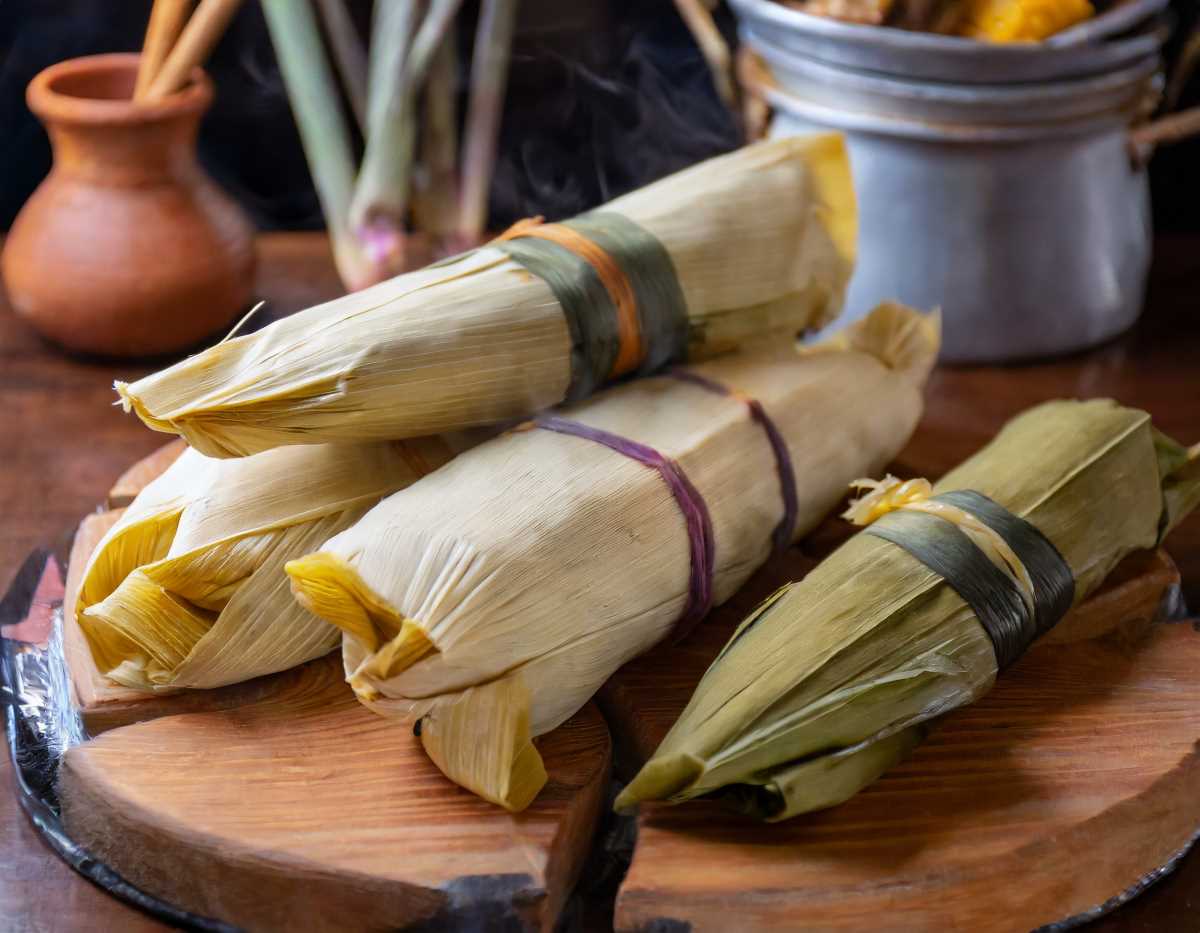 Freshly wrapped tamales ready for steaming, a labor of love and flavor.